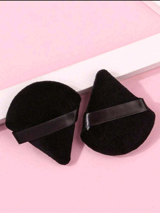 2 borlas de maquillaje
